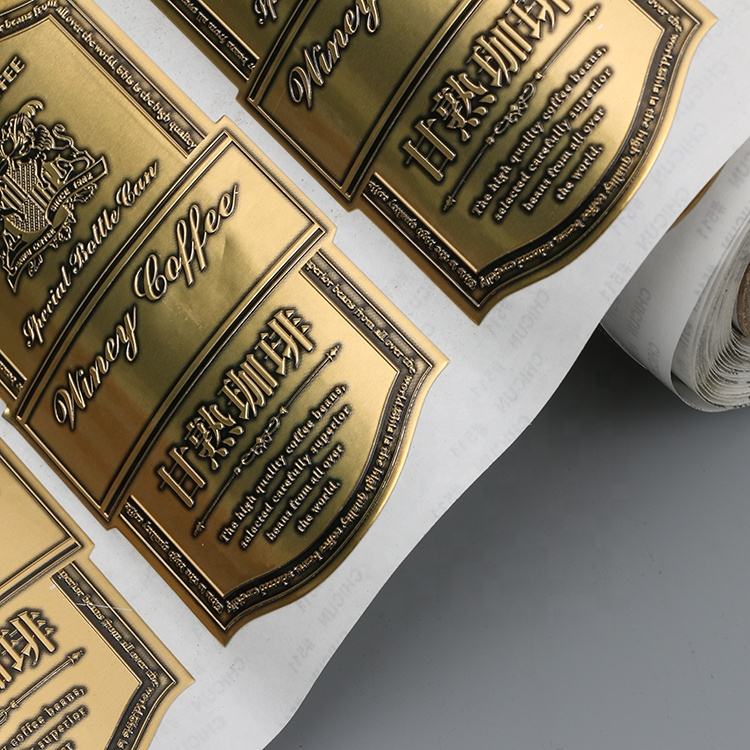 Custom embossed metallic bottle label